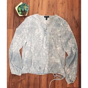 White and grey snake patterned blouse